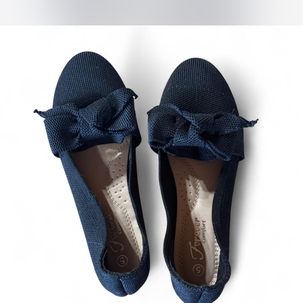 Black slip on shoes. Memory foam insole.